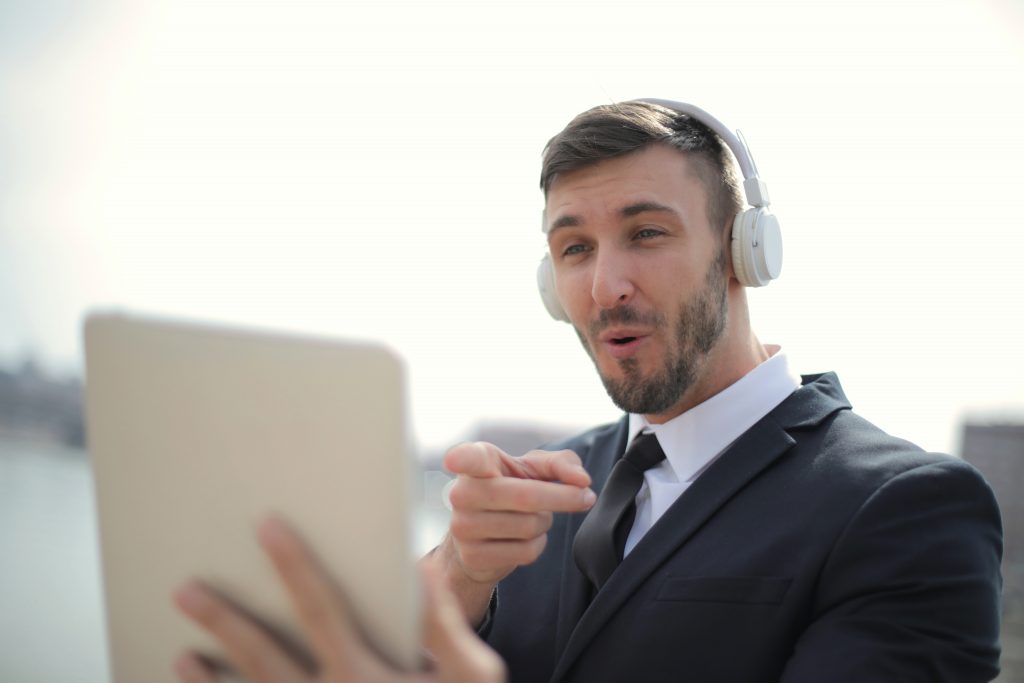 Man pointing at tablet